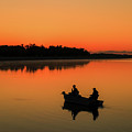 Fishermen Silhouetted At Sunrise